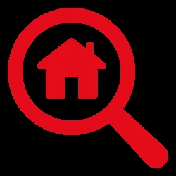 imagen de una casa con un lupa que hace referencia a la tasación de una propiedad